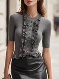 Top de punto gris con volantes